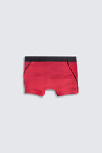 Red boxer briefs with black waistband on a light gray background