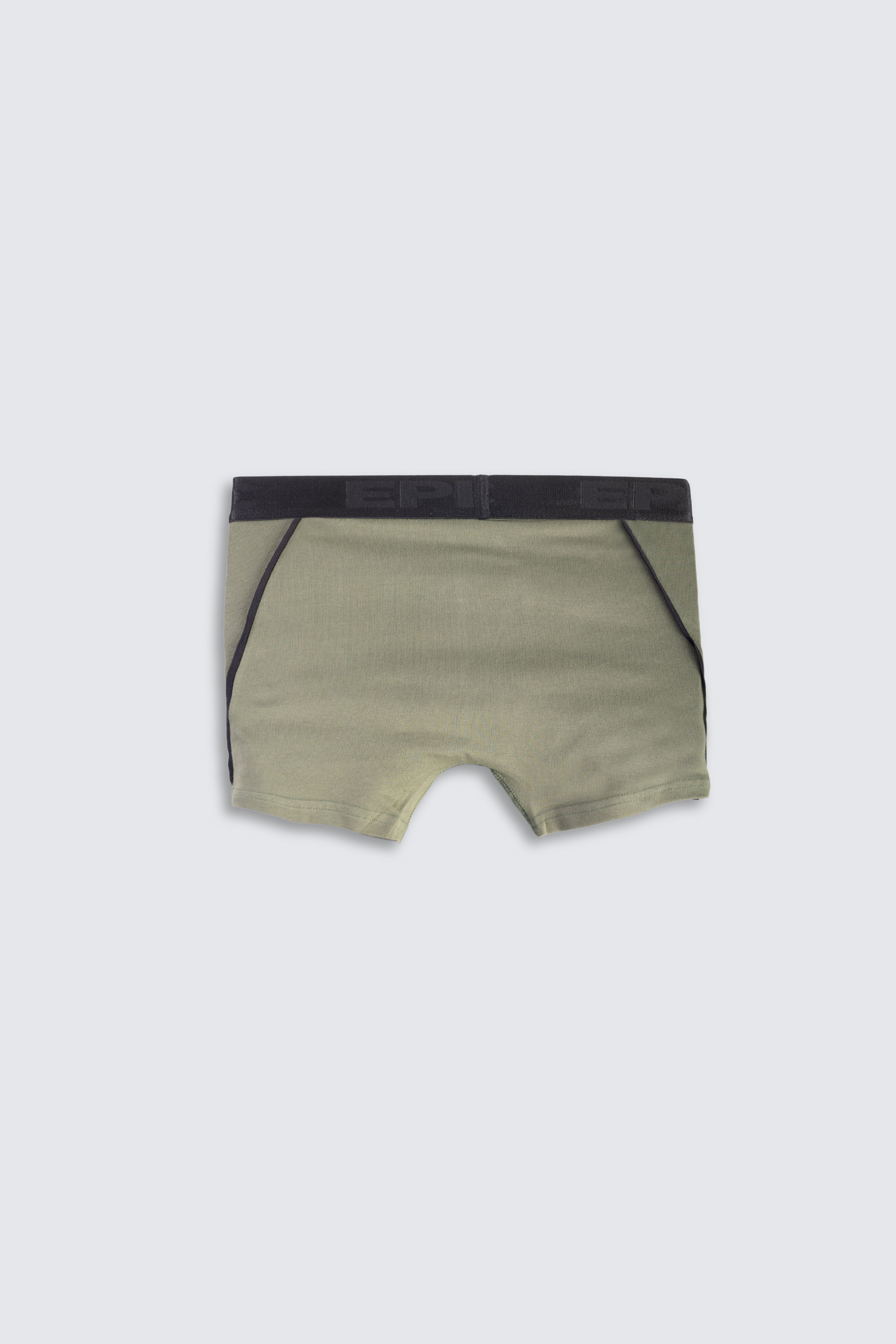 Green boxer briefs with black waistband on a white background